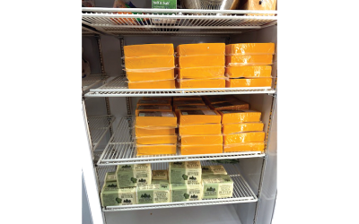 National Farmers Dairy Staff Help Those In Need With Milk, Cheese, and Other Milk Products